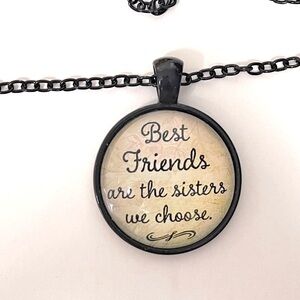 “Best friends are”..18” black chain, NIP, 1”round charm. Clear dome front.